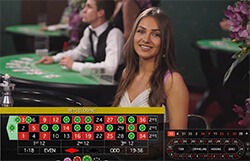 Живой дилер крутит рулетку